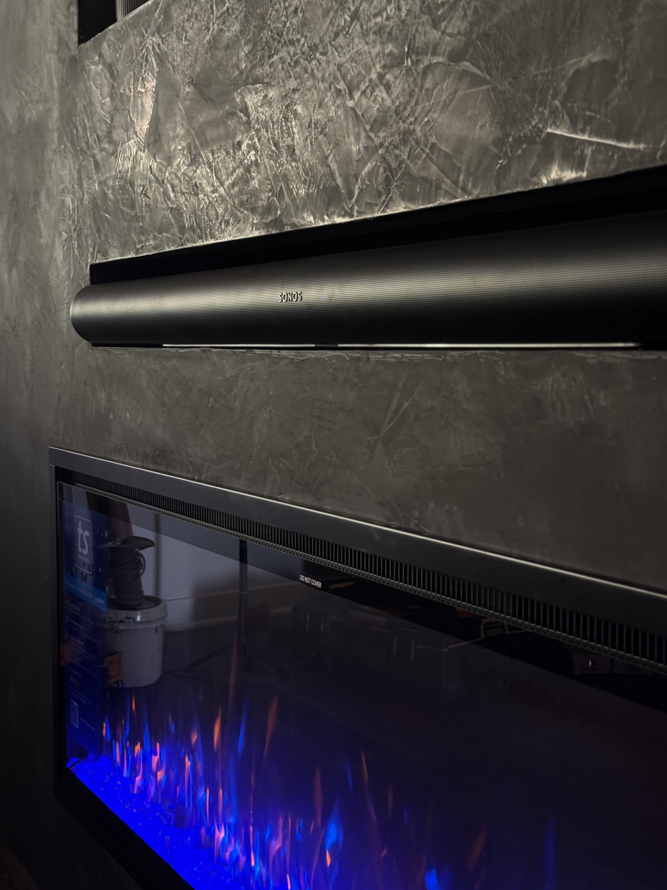Installation — slats, shelves and fireplace coming together